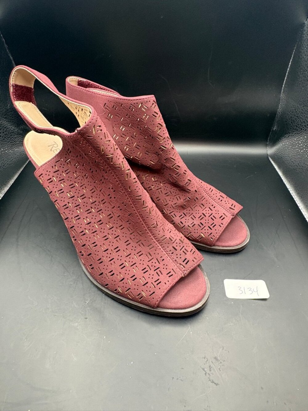 Restricted laser perferated heeled booties - EUC - Size 8